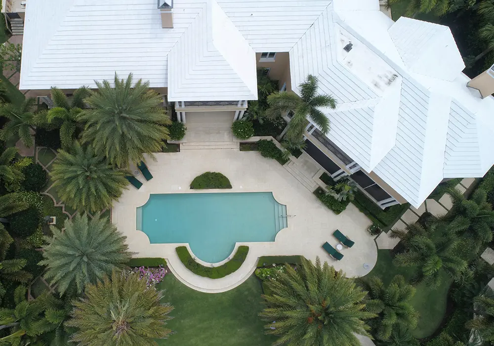 Aerial View Of Home With Pool mortgage refinance